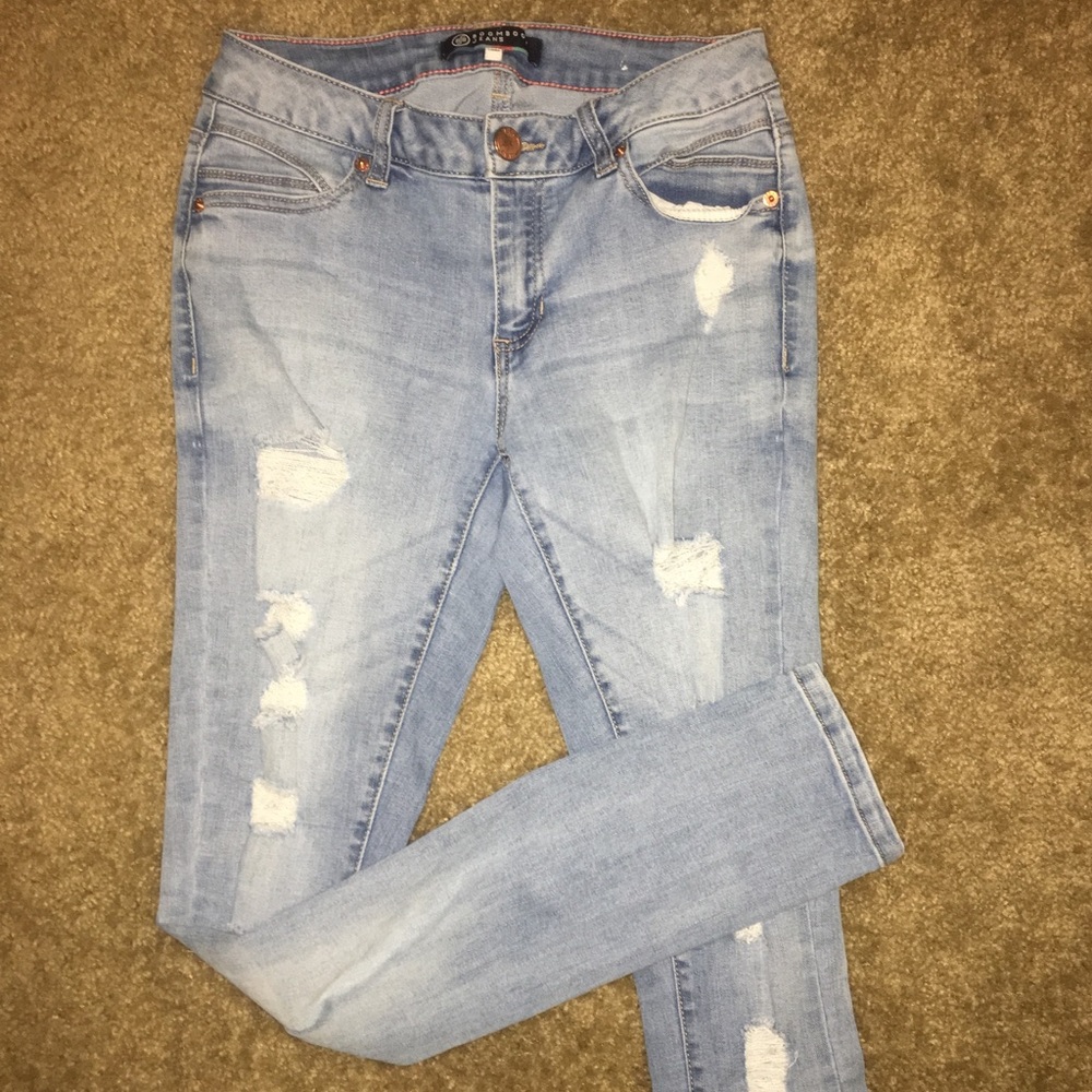 Boom Boom distressed skinny light blue jeans.